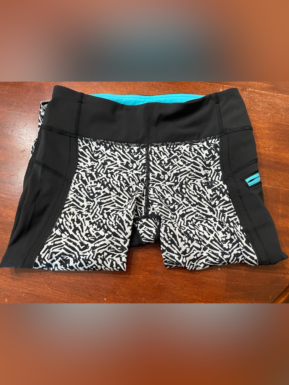 Black & White Lululemon Capri with Turquoise Accents